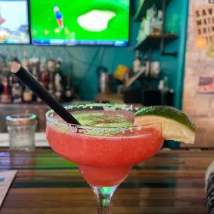 Strawberry blended margarita so delicious made by Astoria. She's so sweet and attentive got us started right away