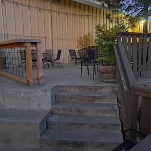 Outdoor patio has 8 tables. 4 up here.