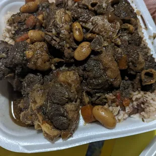 Oxtails and rice and peas