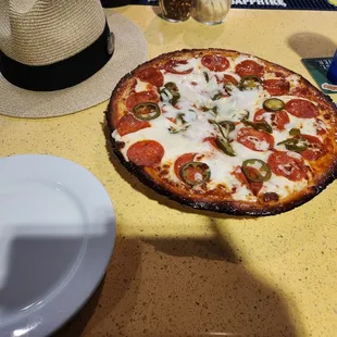 The roni with jalapeños on cauliflower dough, $21 . It may be my favorite crust!