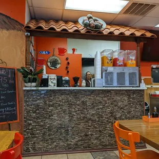 a view of the kitchen and dining area