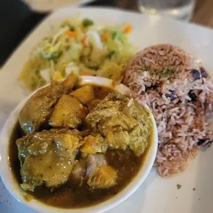 Curry chicken, cabbage and rice and peas