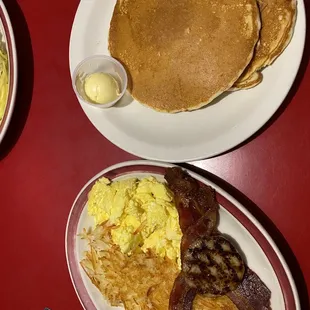 Eggs, bacon, sausage, hash browns and pancakes.