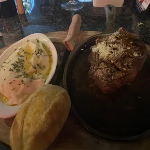 a plate of food and a glass of wine