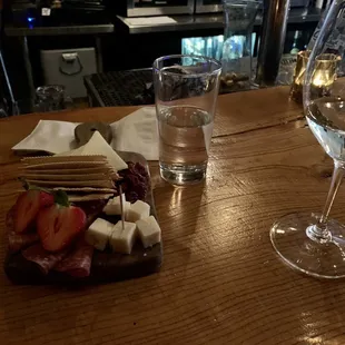 strawberries and cheese on a plate