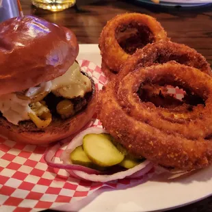 Scorch Burger with onion rings.