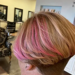 Highlights with fantasy color and hair cut
