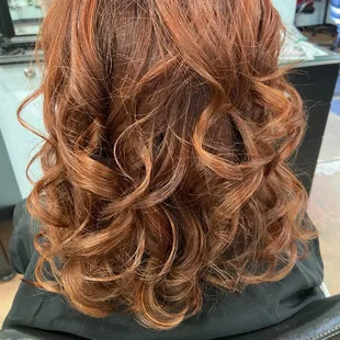Customized red hair color and haircut