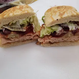 a cut in half sandwich on a cutting board