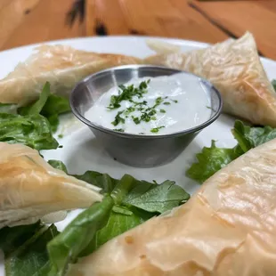 a plate of pitas with dip