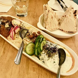 Combination Hummus, Tzatziki and Muhamara. I like the plain hummus only.