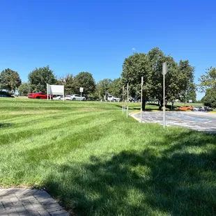 a parking lot with cars parked in the background