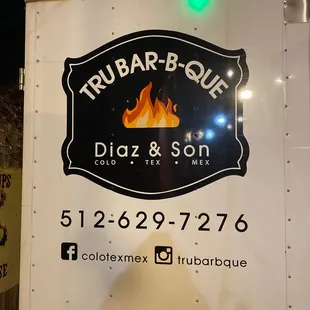 ows a sign for the restaurant