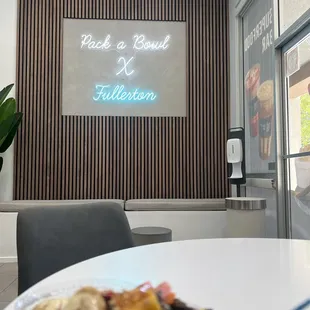 My açaí bowl with a quirky sign