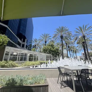outside seating with fountain and shade
