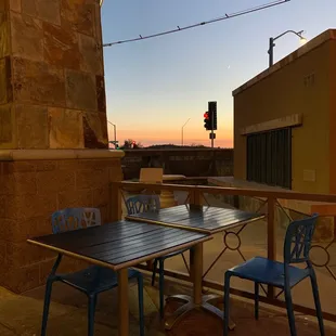 a table and chairs on a patio