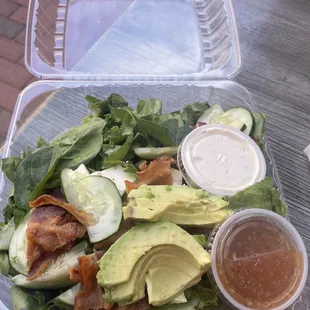 Salad with bacon, avocados, cucumbers, pepper Jack &amp; blue cheese+zesty Italian