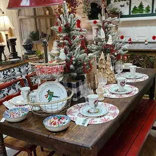 Gorgeous table place setting with Christmas tree centerpieces