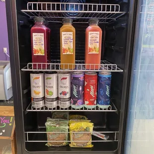 a fridge full of juices