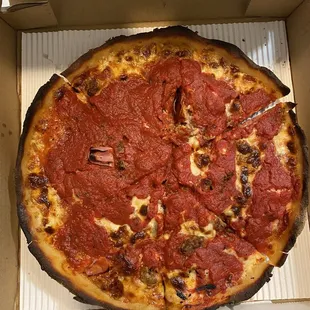 Deep dish meat lovers pizza