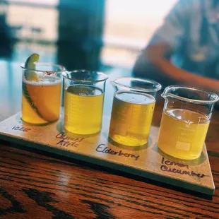 Beer flight available in the Sour house. (Left to right) pickle, caramel apple, elderberry, and lemon cucumber. Lemon cucumber was my fav!