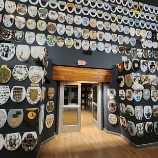 plates on the wall of a restaurant