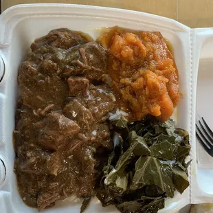 Beef Tips and rice with collard greens and sweet potatoes.