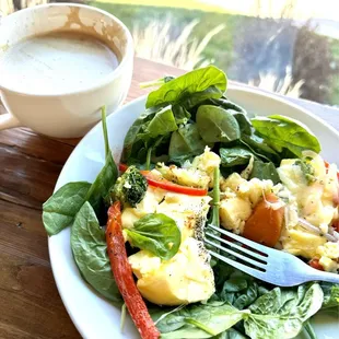 Honey mile latte paired with a healthy breakfast (unwrapped spinach and eggs)