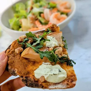 Seasonal truffle pear flatbread front and simple but delicious chopped salad with shrimp in the back