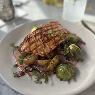 Salmon entree with brussel sprouts and fingerling potatoes