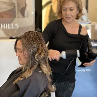 salon owner in action