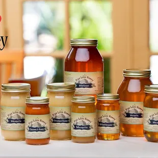 a variety of jars of honey