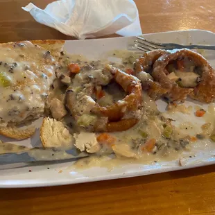 Turkey on sourdough and onion rings smothered in wild rice soup