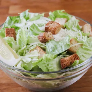 a salad in a glass bowl