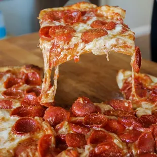 a slice of pepperoni pizza