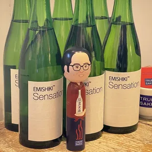 bottles of wine and a figurine