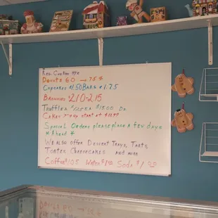 a whiteboard with a list of items on it
