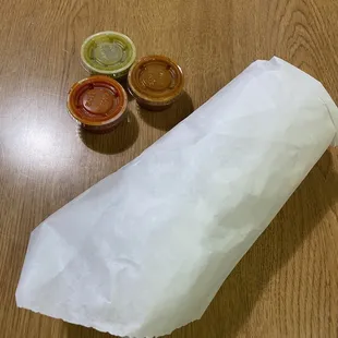 California burrito and three hot sauces