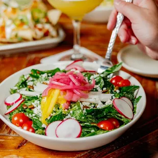 a person eating a salad