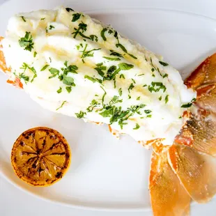 SOUTH AFRICAN COLD-WATER LOBSTER TAIL butter finished &amp; carved tableside
