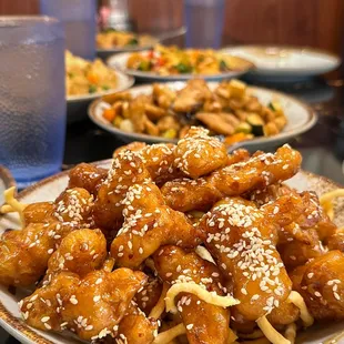 a plate of chicken and noodles