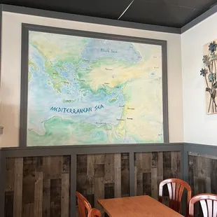 a map on the wall of a restaurant