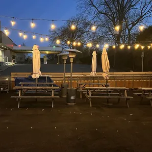 patio with tables and umbrellas