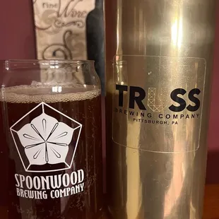 a beer can and a glass