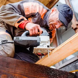 a man using a circular saw