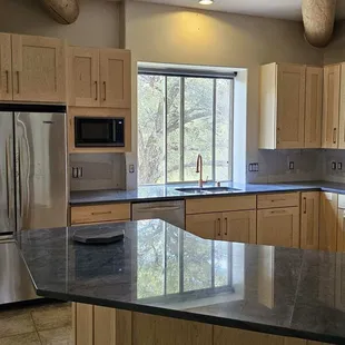 a kitchen with stainless steel appliances