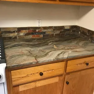 a kitchen counter with a stove