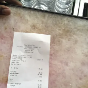 I have never heard of five dollars gratuity on a $25 purchase  on 1 person
