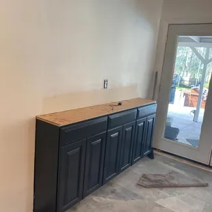 a man standing in a kitchen