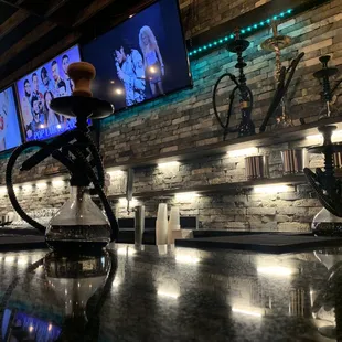 a bar with bikes on the wall